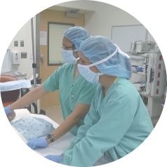 Students preparing the patient for a surgical procedure