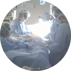 Students scrubbed-in during a surgical procedure